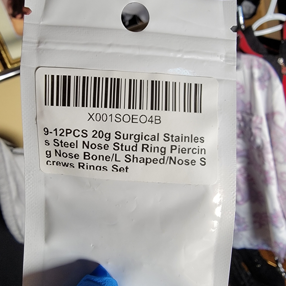 Brand new Never Nose Rings Never opened Blue, Pink, and Silver